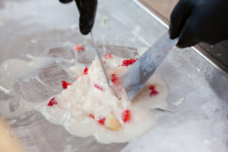 Nutella pizza dessert with strawberries and cream