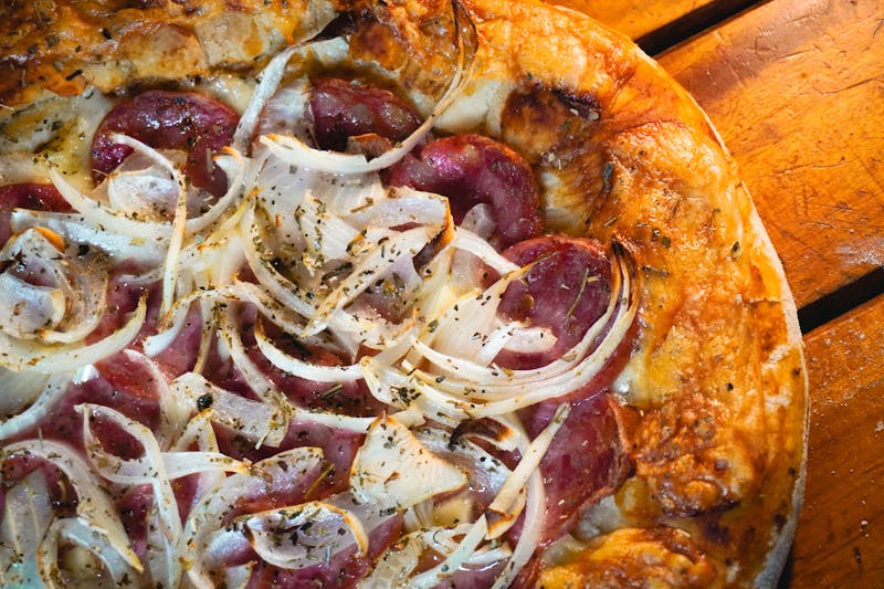 Punch pizza Diavola with spicy salami and chili