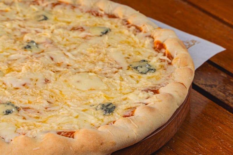Four cheese punch pizza with gorgonzola and ricotta